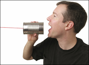 speaking into a tin can telephone
