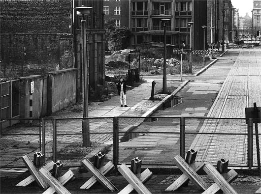 Man at Berlin Wall